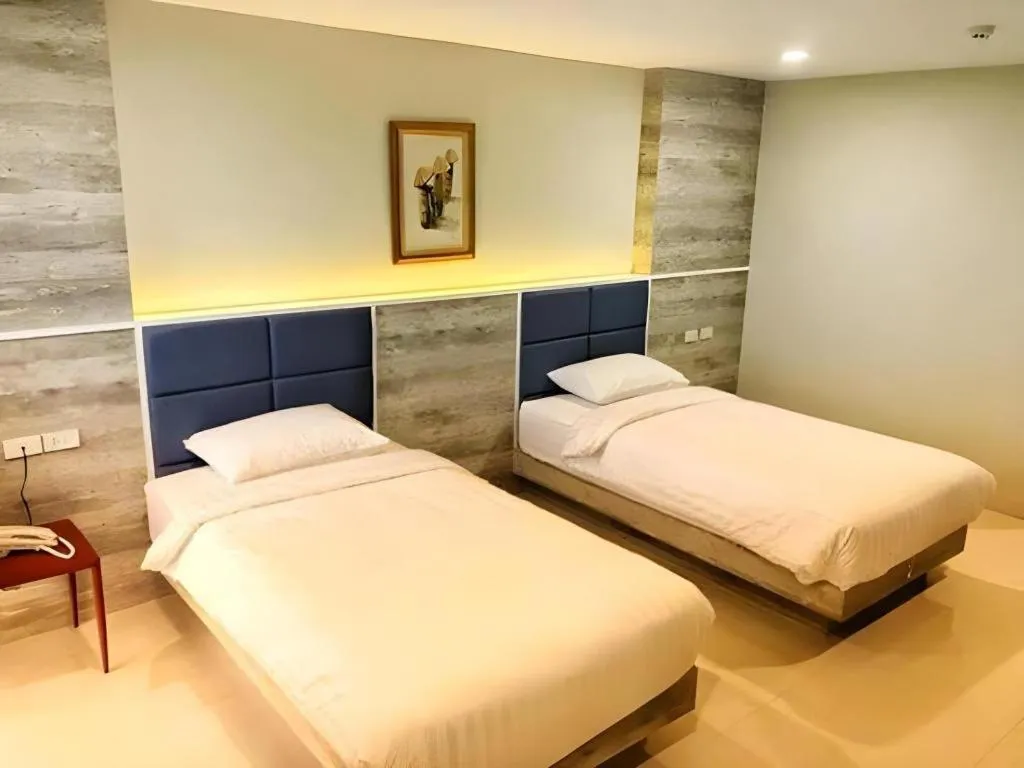Bed in Sattahip 9 Boutique Hotel