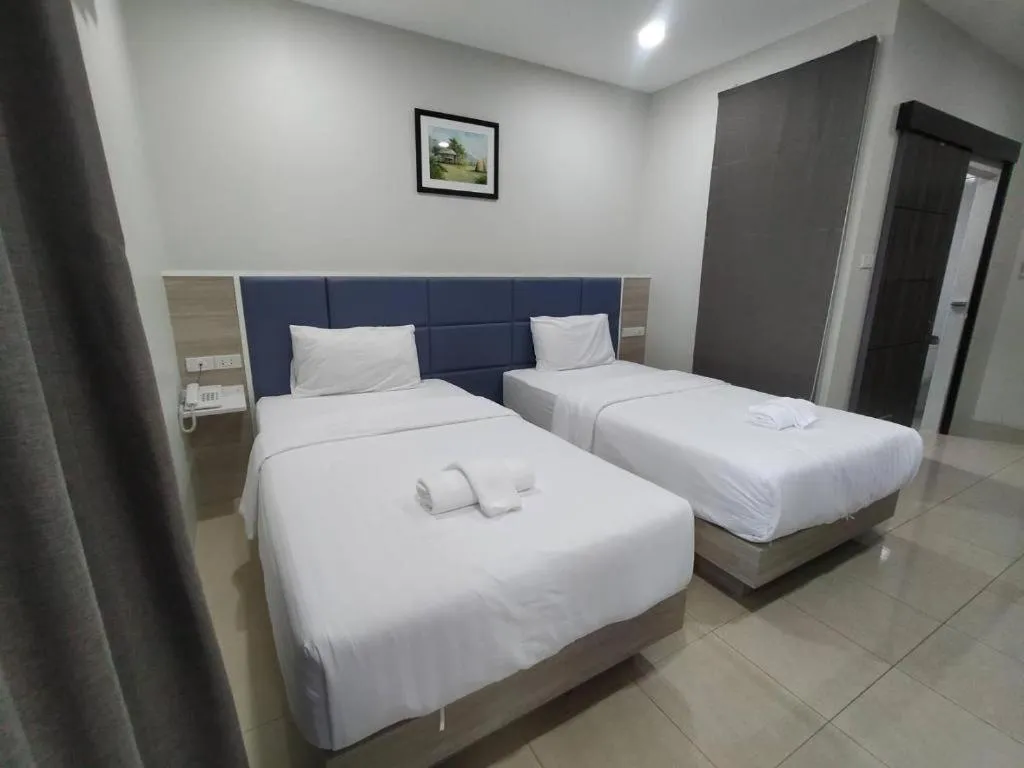 Bed in Sattahip 9 Boutique Hotel