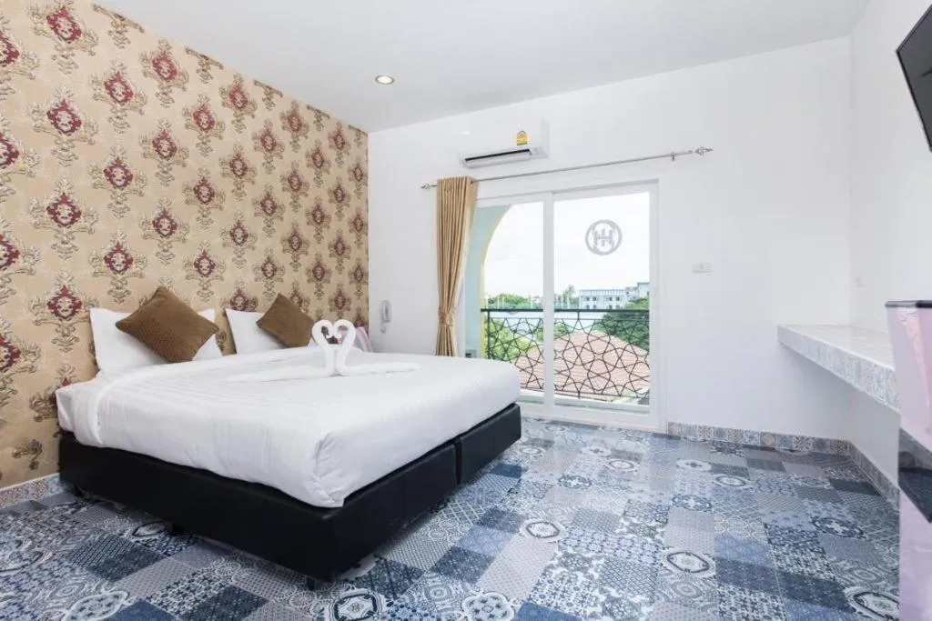 Bed in Oasis Hiso Hotel