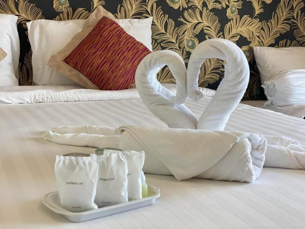 Bed in Oasis Hiso Hotel