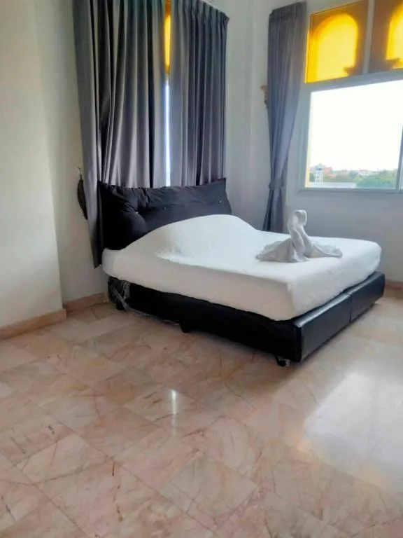 Bed in Oasis Hiso Hotel