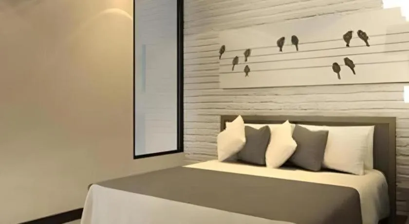 Bed in Oasis Hiso Hotel