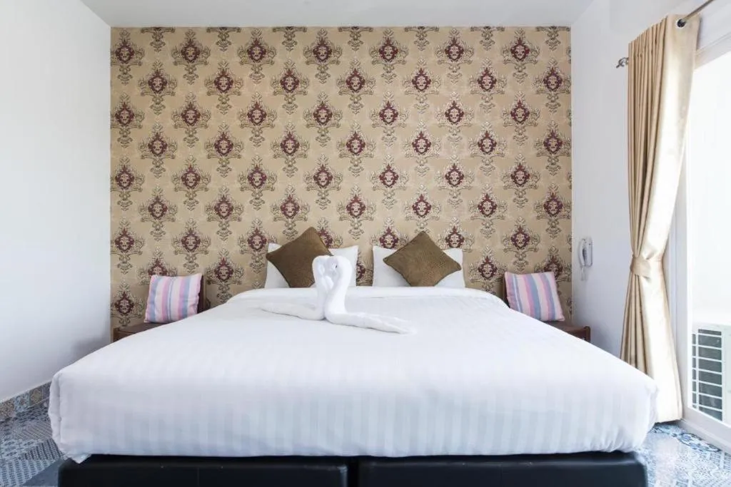 Bed in Oasis Hiso Hotel