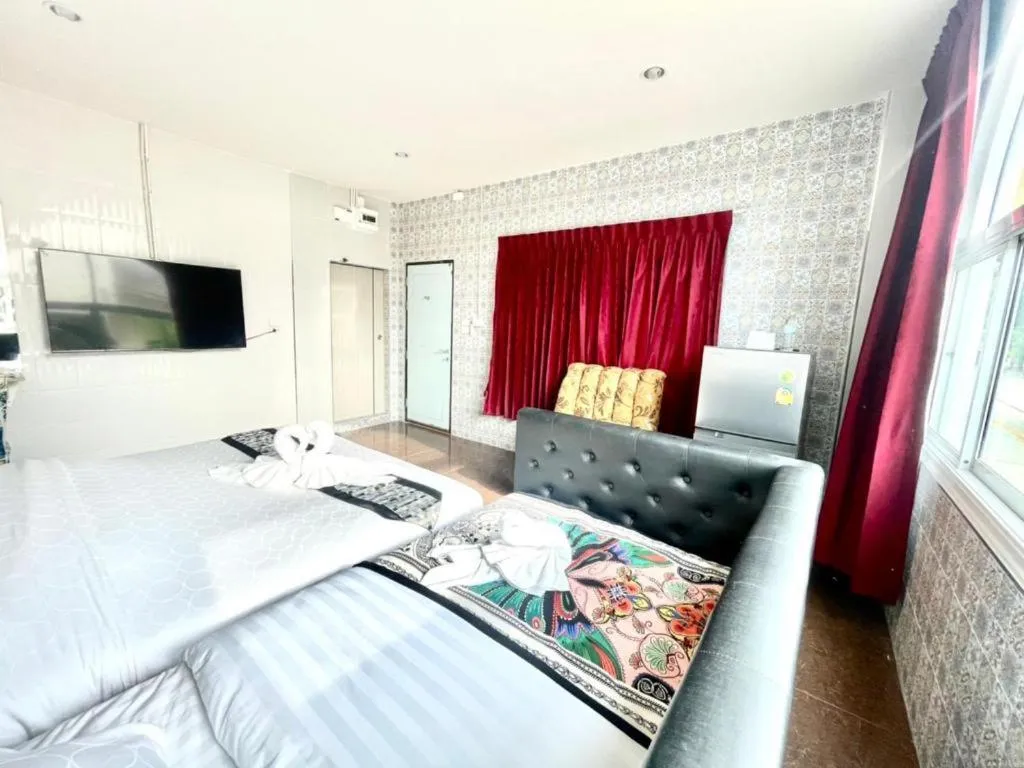 Bed in Oasis Hiso Hotel