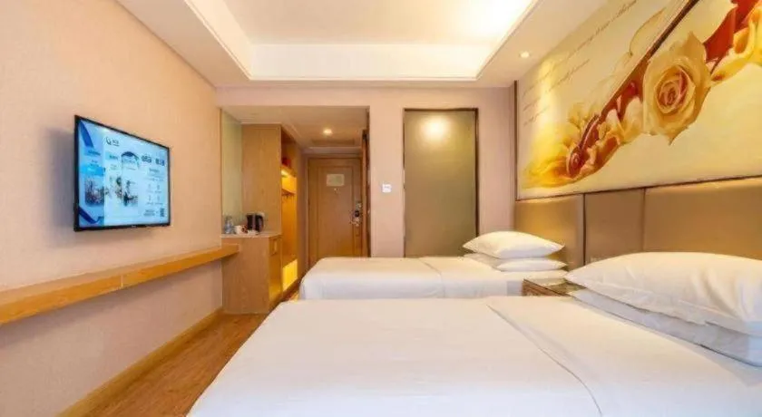 Bed in Vienna Hotel Nanning Xiangsi Lake University Town