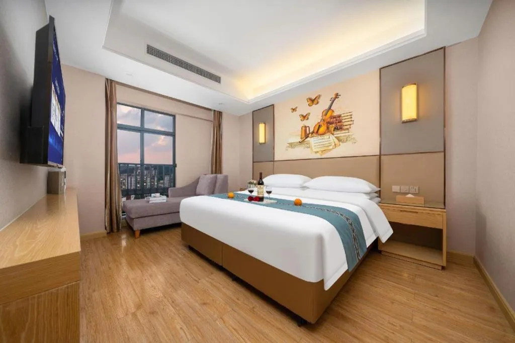 Bed in Vienna Hotel Nanning Xiangsi Lake University Town
