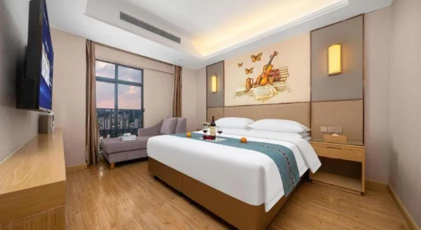 Bed in Vienna Hotel Nanning Xiangsi Lake University Town