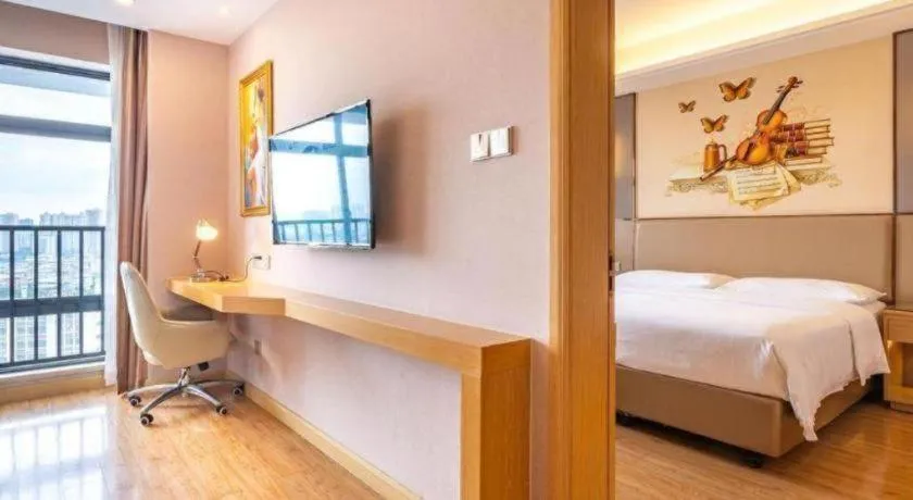 Bed in Vienna Hotel Nanning Xiangsi Lake University Town