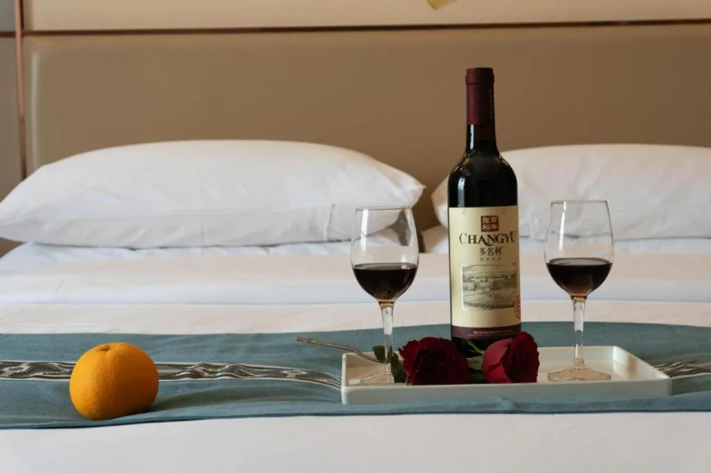 Bed in Vienna Hotel Nanning Xiangsi Lake University Town