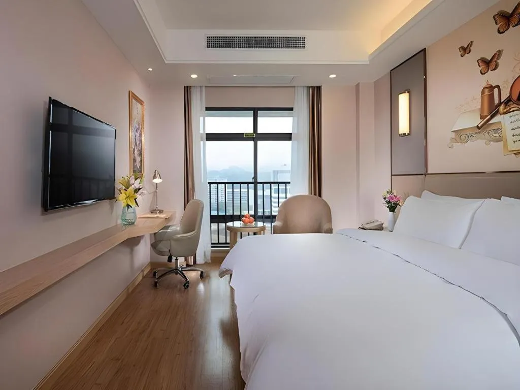 Bed in Vienna Hotel Nanning Xiangsi Lake University Town