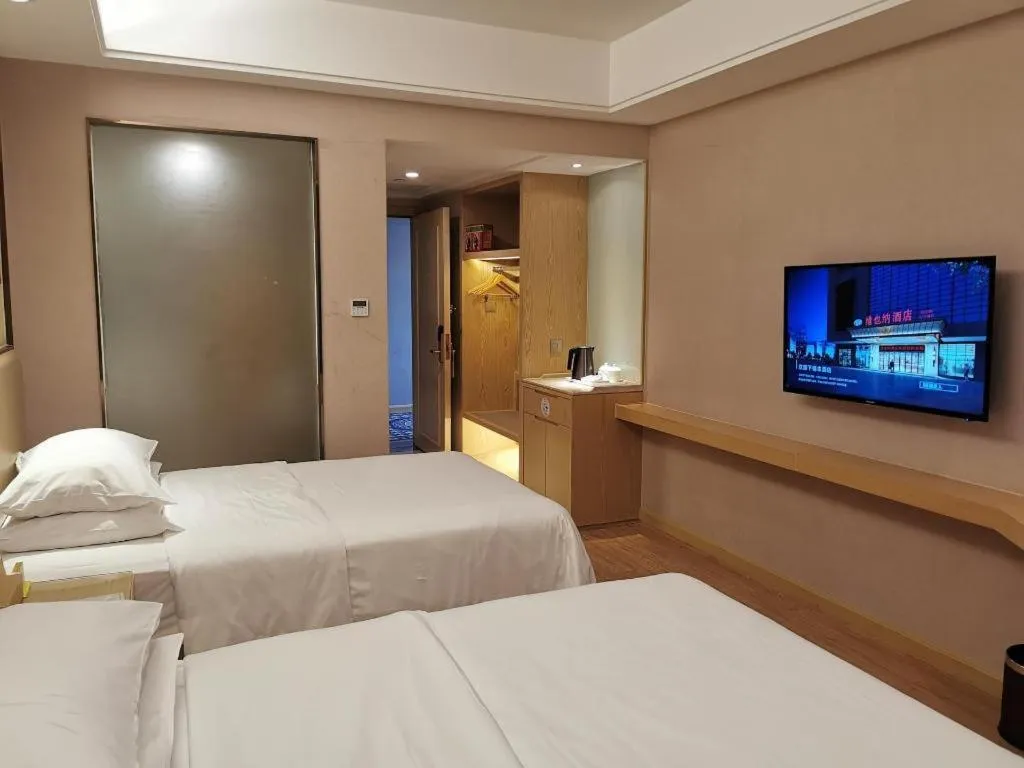 Bed in Vienna Hotel Nanning Xiangsi Lake University Town