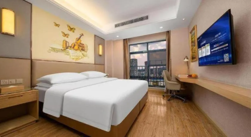 Bed in Vienna Hotel Nanning Xiangsi Lake University Town