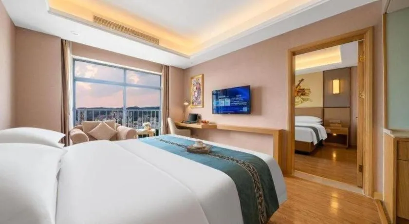 Bed in Vienna Hotel Nanning Xiangsi Lake University Town