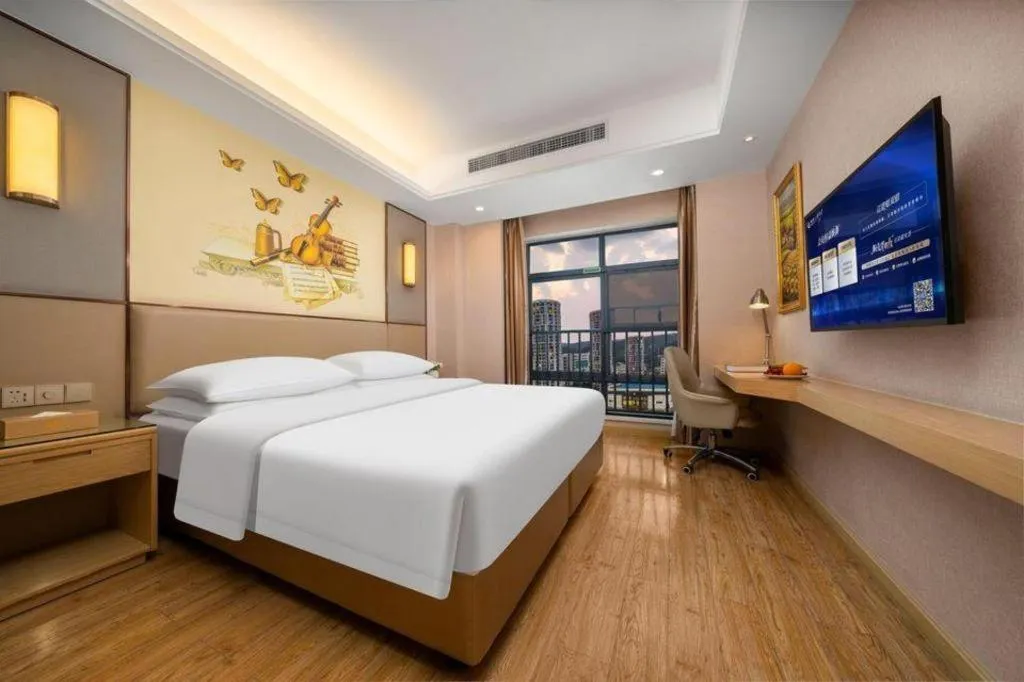 Bed in Vienna Hotel Nanning Xiangsi Lake University Town