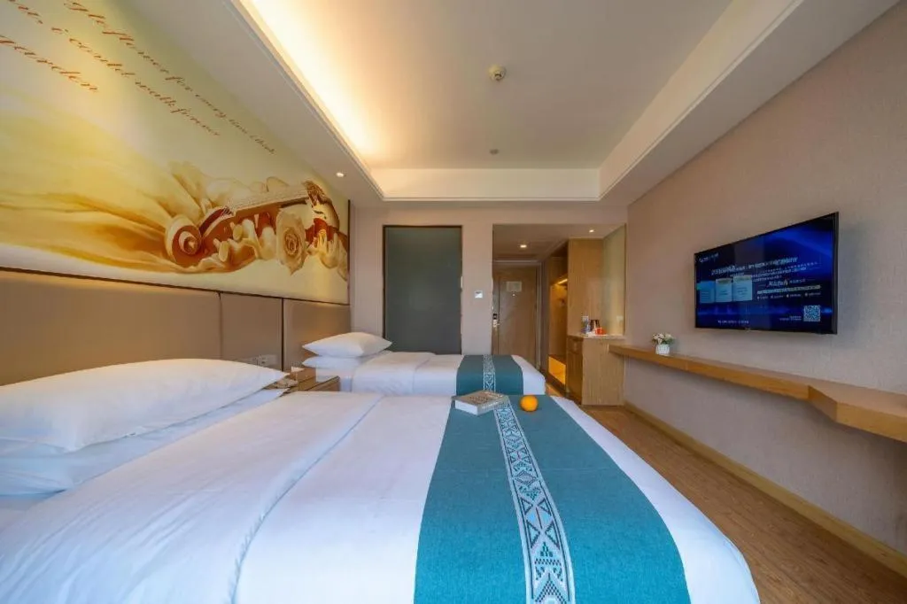 Bed in Vienna Hotel Nanning Xiangsi Lake University Town