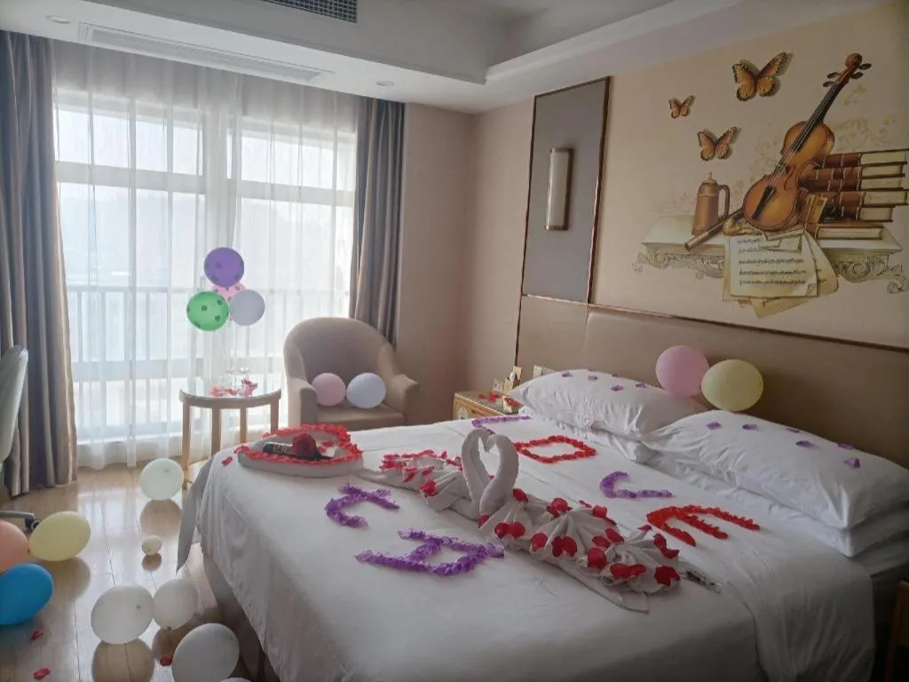 Bed in Vienna Hotel Nanning Xiangsi Lake University Town