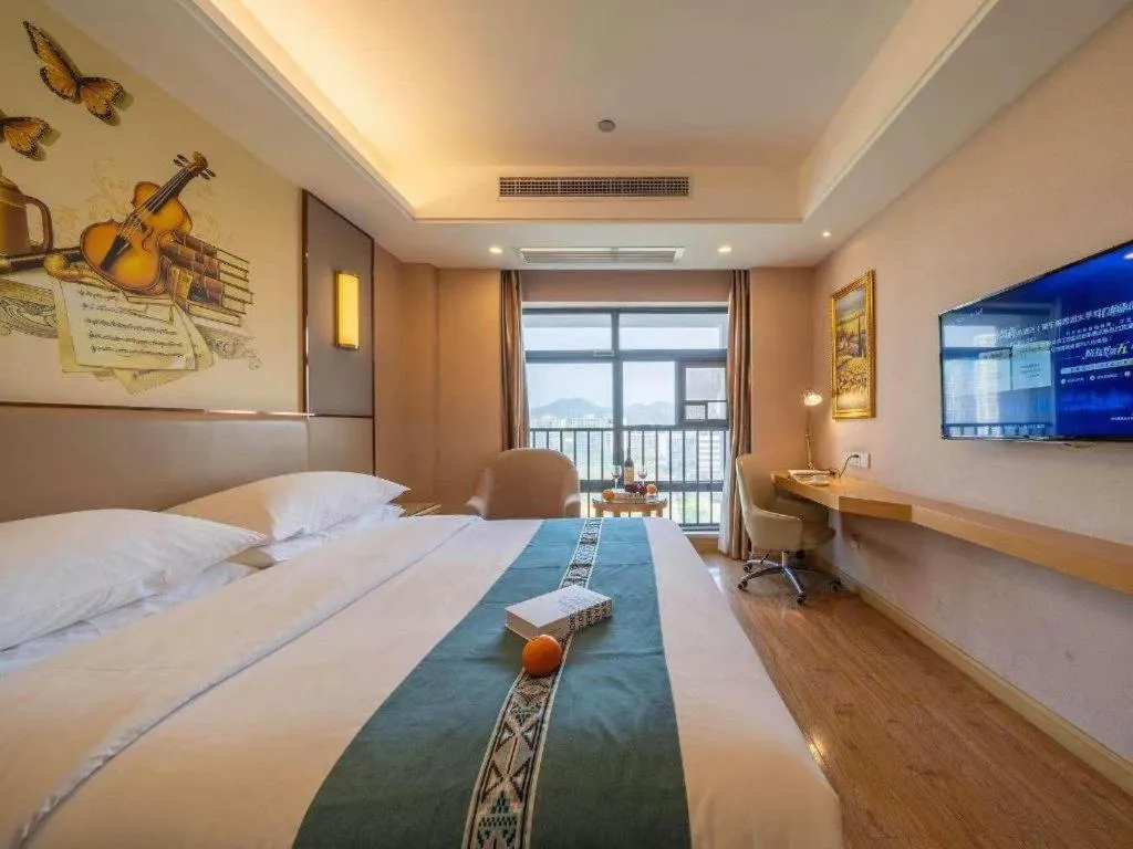 Bed in Vienna Hotel Nanning Xiangsi Lake University Town