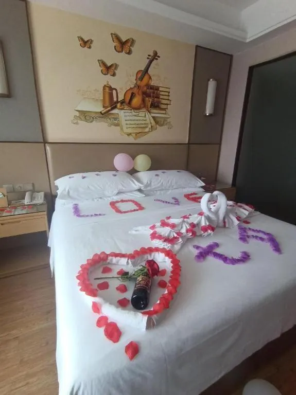 Bed in Vienna Hotel Nanning Xiangsi Lake University Town