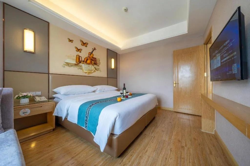 Bed in Vienna Hotel Nanning Xiangsi Lake University Town