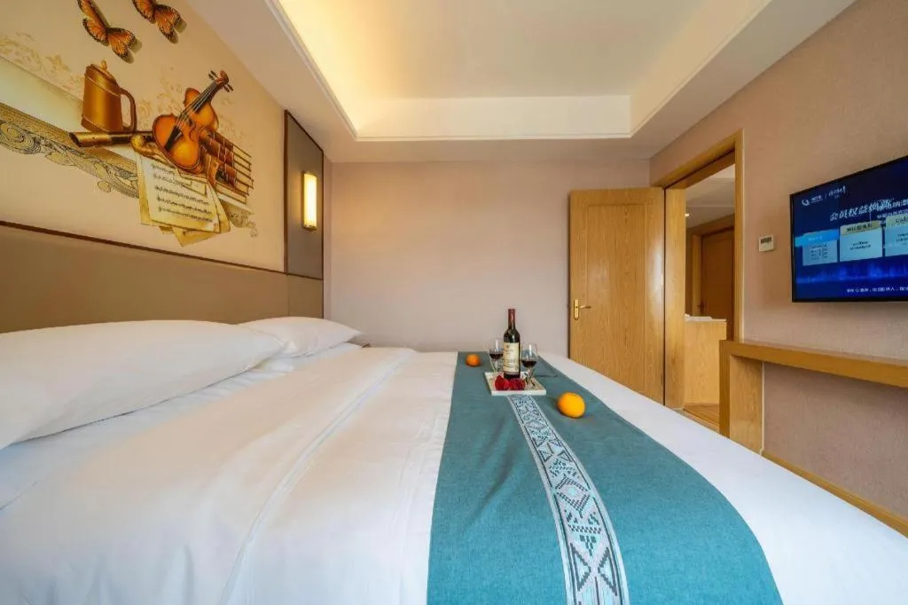 Bed in Vienna Hotel Nanning Xiangsi Lake University Town