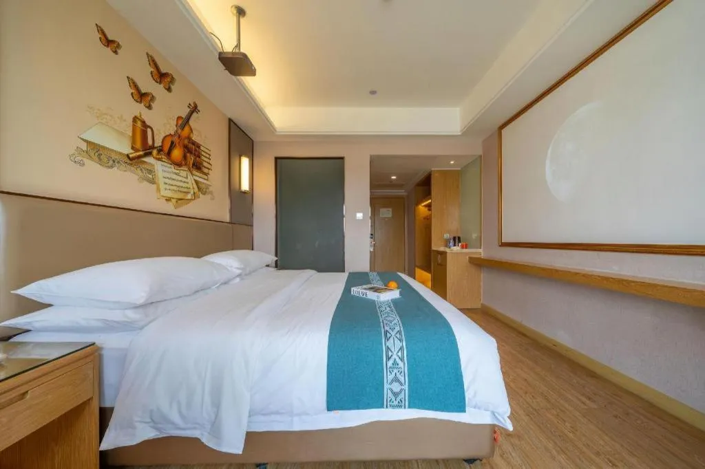 Bed in Vienna Hotel Nanning Xiangsi Lake University Town