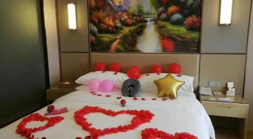 Bed in Vienna Hotel Nanning Xiangsi Lake University Town