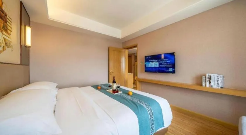 Bed in Vienna Hotel Nanning Xiangsi Lake University Town