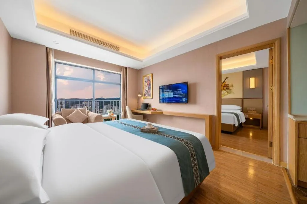 Bed in Vienna Hotel Nanning Xiangsi Lake University Town