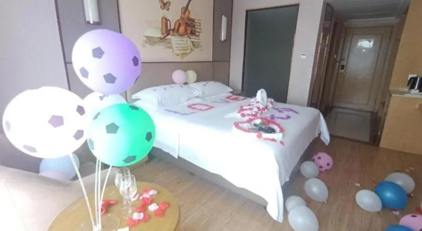 Bed in Vienna Hotel Nanning Xiangsi Lake University Town