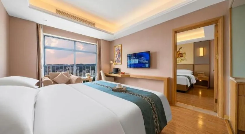 Bed in Vienna Hotel Nanning Xiangsi Lake University Town