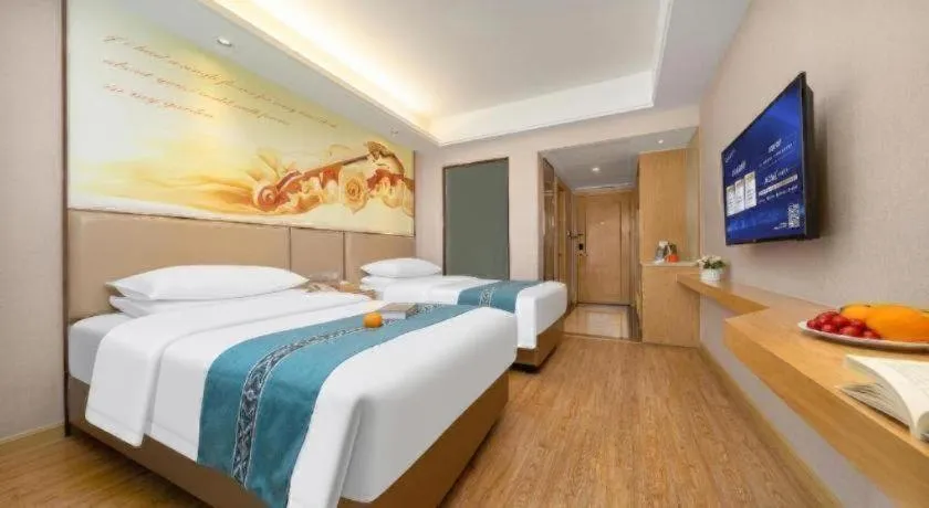 Bed in Vienna Hotel Nanning Xiangsi Lake University Town