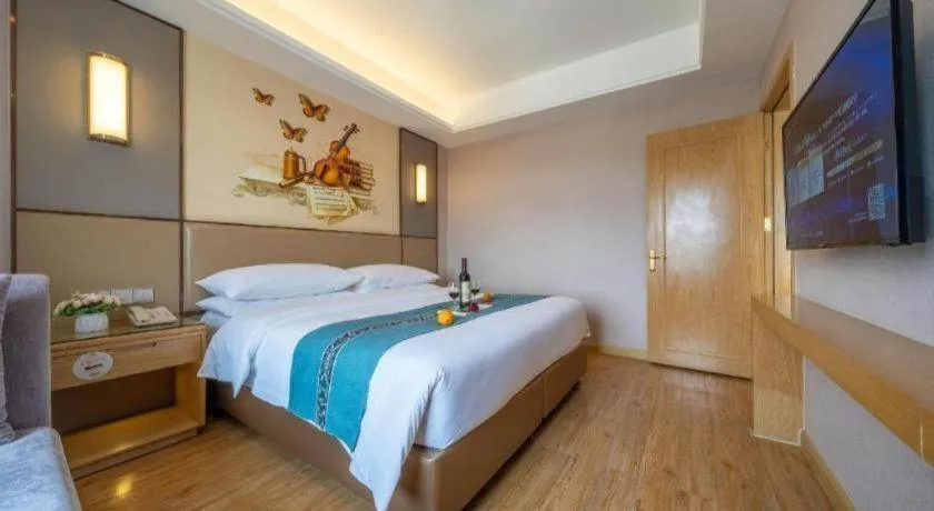 Bed in Vienna Hotel Nanning Xiangsi Lake University Town