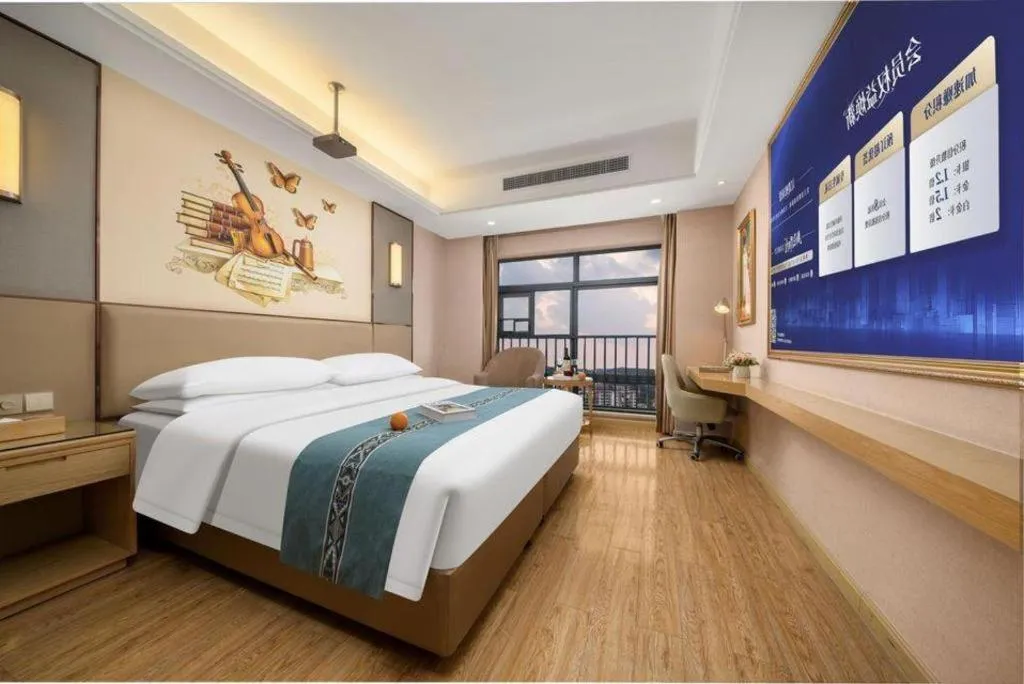 Bed in Vienna Hotel Nanning Xiangsi Lake University Town