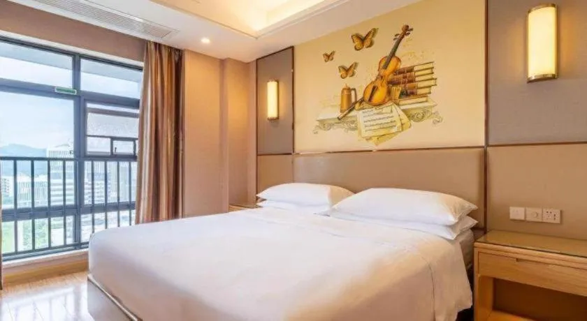 Bed in Vienna Hotel Nanning Xiangsi Lake University Town