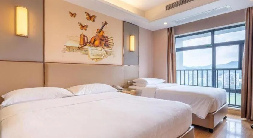 Bed in Vienna Hotel Nanning Xiangsi Lake University Town