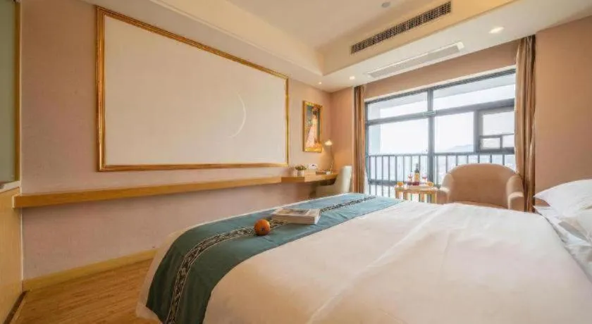 Bed in Vienna Hotel Nanning Xiangsi Lake University Town