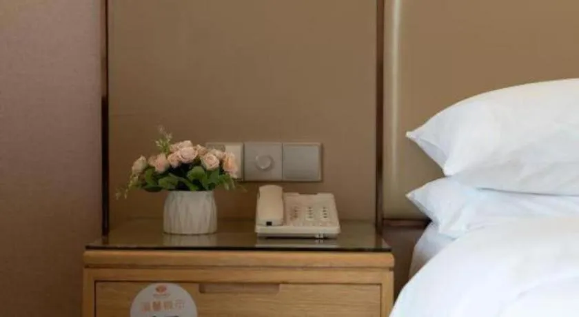 Bed in Vienna Hotel Nanning Xiangsi Lake University Town