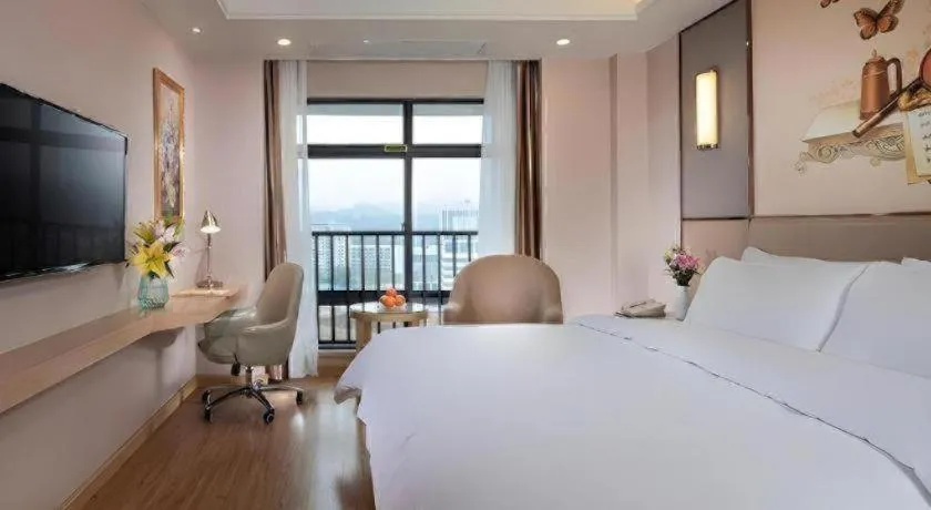 Bed in Vienna Hotel Nanning Xiangsi Lake University Town