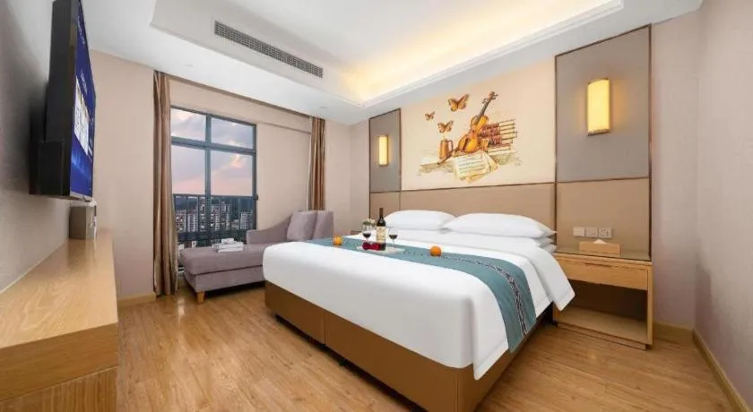 Bed in Vienna Hotel Nanning Xiangsi Lake University Town