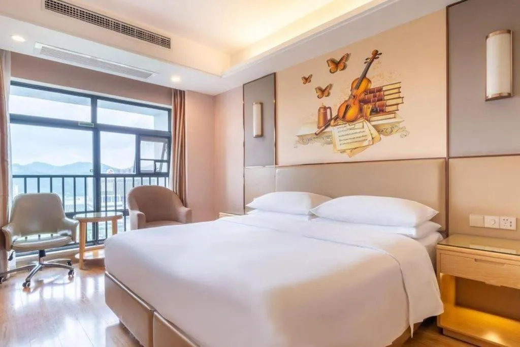 Bed in Vienna Hotel Nanning Xiangsi Lake University Town