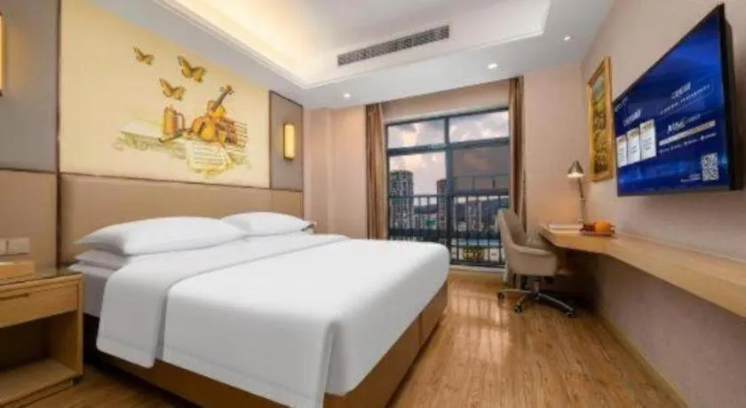 Bed in Vienna Hotel Nanning Xiangsi Lake University Town