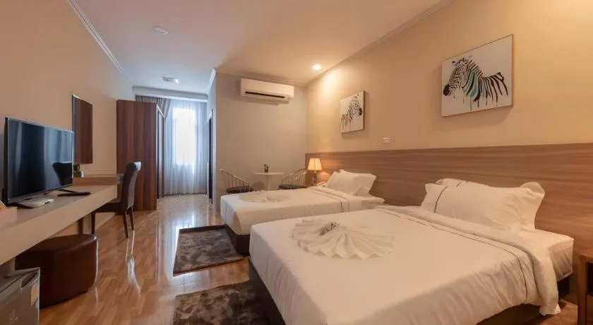 Bed in One Vientiane Hotel