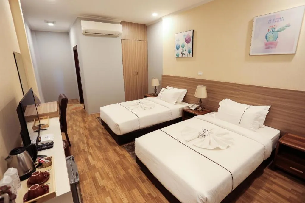 Bed in One Vientiane Hotel