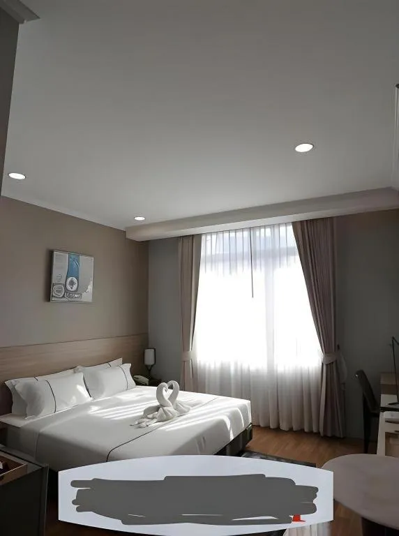 Bed in One Vientiane Hotel