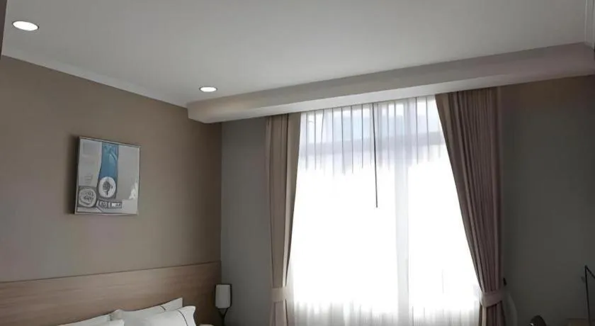 Bed in One Vientiane Hotel