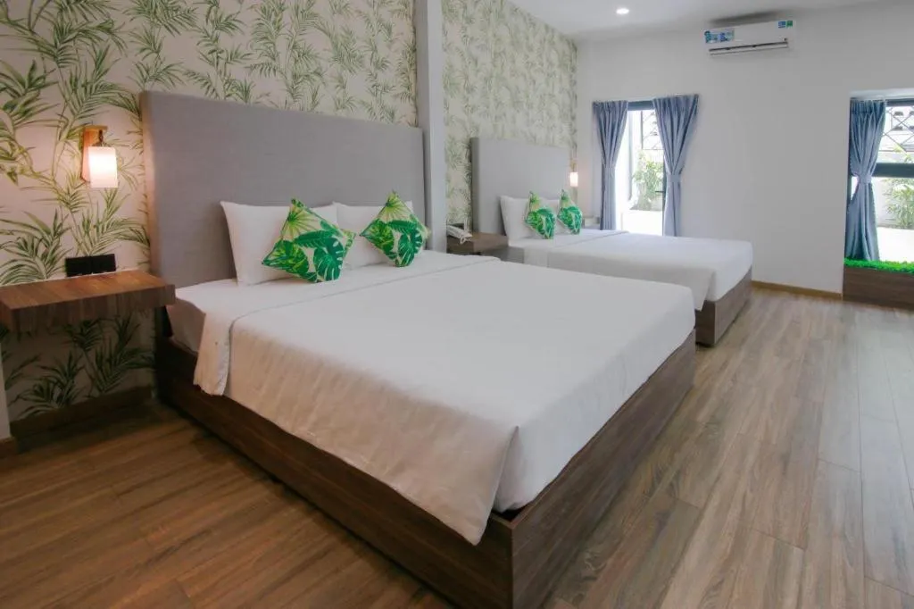 Bed in Green Oasis Hotel