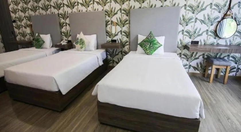 Bed in Green Oasis Hotel
