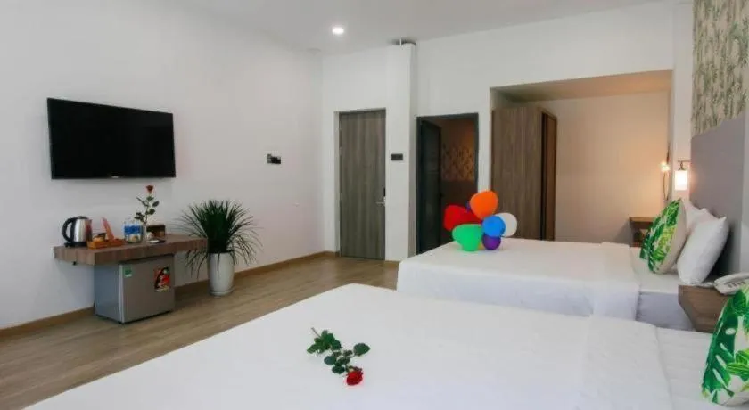 Bed in Green Oasis Hotel