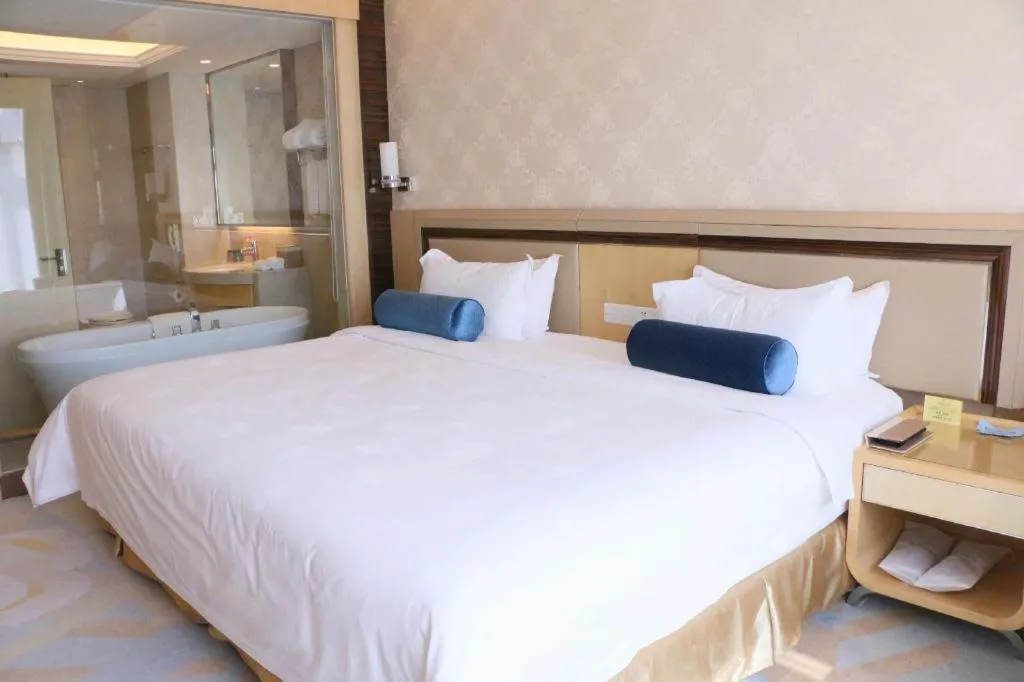 Bed in Shanghai Fuyue Hotel