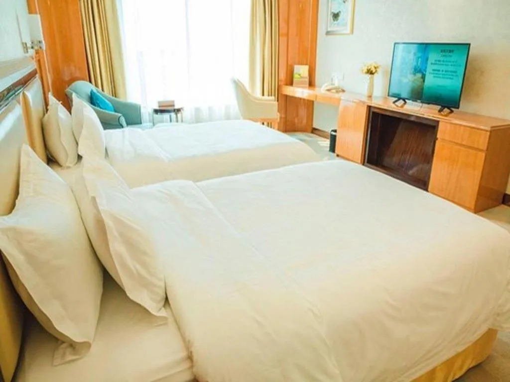 Bed in Shanghai Fuyue Hotel